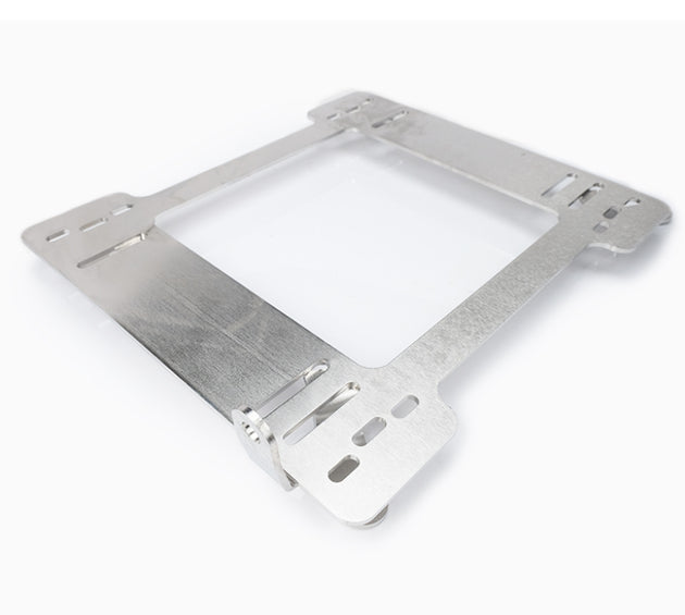 Pair of NRG seat brackets for BMW E46 99-05, sturdy metal frames designed for secure seat mounting in automotive upgrades.