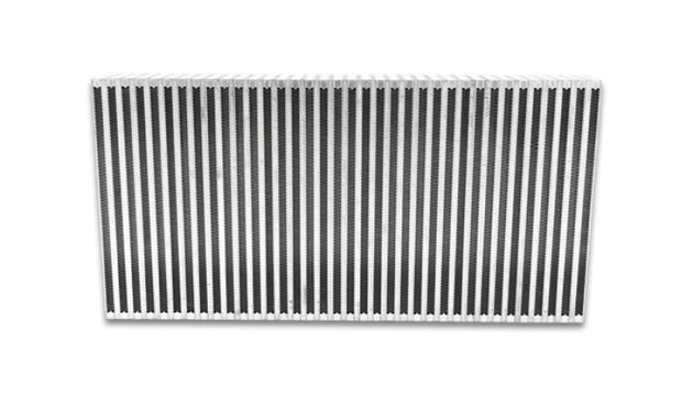 Vibrant vertical flow intercooler core with 24-inch width, 12-inch height, and 3.5-inch thickness for improved cooling performance.