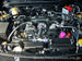 HKS Premium Cold Air Intake for ZN6/ZC6 FA20 engine, showing sleek black intake components and brand logo on the product.
