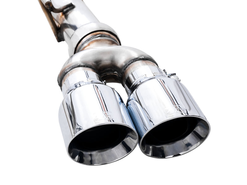 AWE Tuning 4th Gen GM 1500 6.2L catback exhaust with split rear exit and quad chrome tips, showing the polished exhaust tips and bumper cutouts.