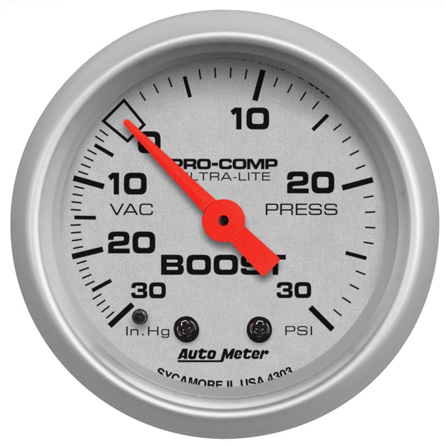 AutoMeter Ultra-Lite 52mm mechanical boost gauge showing black dial with white markings and a silver bezel.