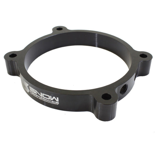 Snow Performance 102mm LS throttle body injection plate for water methanol systems, shown mounted on engine intake.