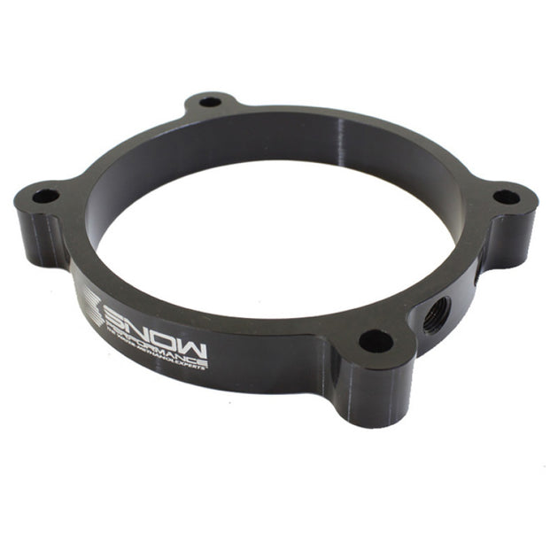 Snow Performance 102mm LS throttle body injection plate for water methanol systems, shown mounted on engine intake.