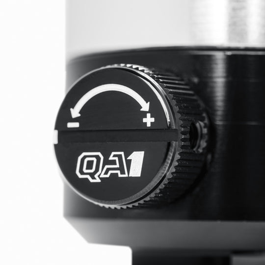 QA1 Proma Star Series 10-inch adjustable silver shock spring kit for shocks and struts, featuring durable metal construction.