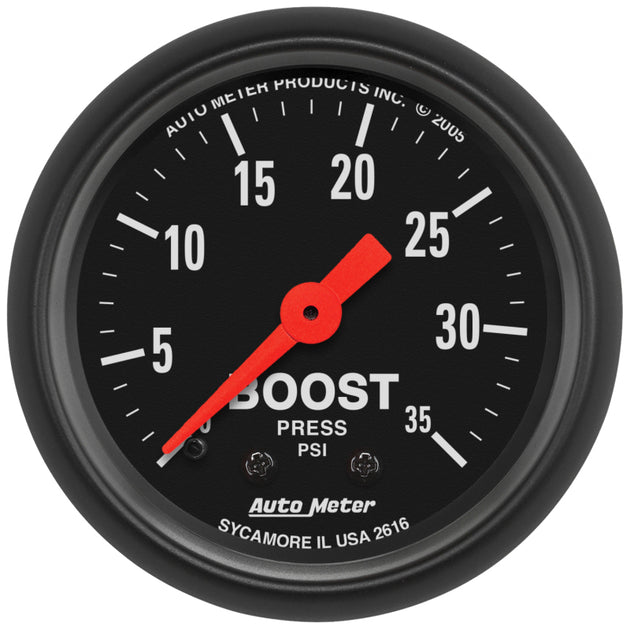 AutoMeter Z Series 52mm mechanical boost gauge showing 0-35 PSI with clear dial and black bezel for automotive performance monitoring.