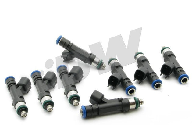 DeatschWerks LS1/LS6 Series 50lb fuel injector set for 4.6L and 5.0L V8 Mustang engines, showing eight high-performance injectors.