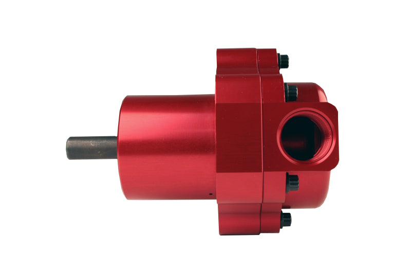Aeromotive billet belt drive fuel pump installed in a vehicle, showcasing its sturdy metal construction and precise engineering.