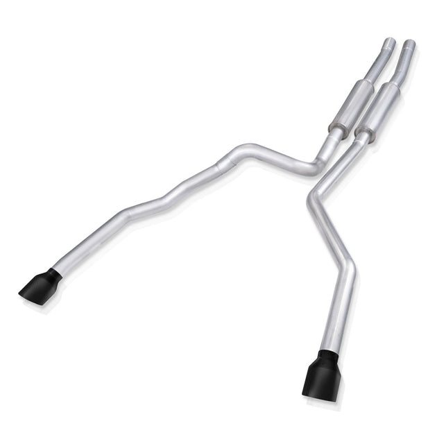 Stainless Works 21-24 Ram TRX 6.2L catback exhaust system with matte black tips, installed on a Ram TRX pickup truck.