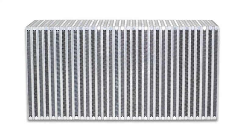 Vibrant vertical flow intercooler core with 22-inch width, 11-inch height, and 6-inch thickness for turbocharged engines.