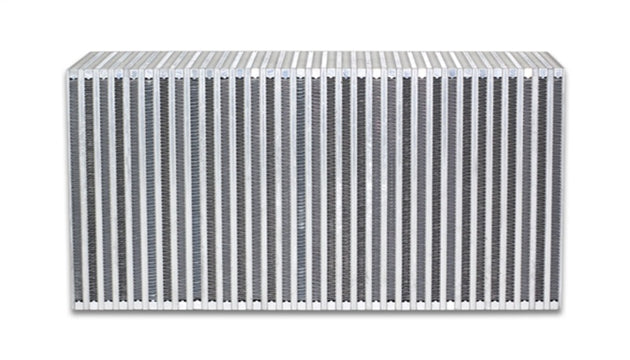 Vibrant vertical flow intercooler core with 22-inch width, 11-inch height, and 6-inch thickness for turbocharged engines.