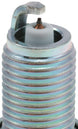 Set of four NGK Iridium IX spark plugs with metal shells and black insulators, designed for vehicle ignition systems.