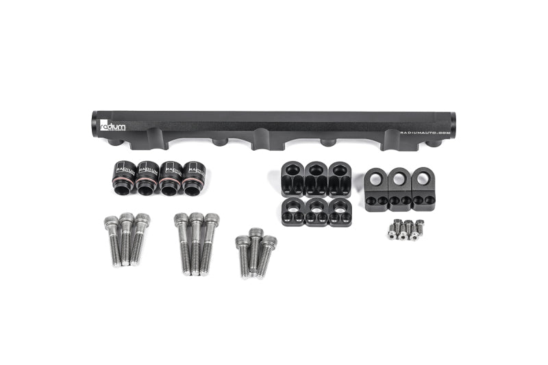 Radium Engineering Toyota 3S-GE/3S-GTE Gen 3-5 fuel rail showing polished metal construction and mounting ports for fuel delivery.