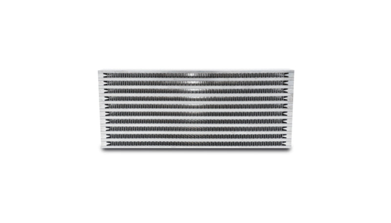 Vibrant universal oil cooler core with 4x10x1.25 inch aluminum cooling fins for automotive engine temperature regulation.