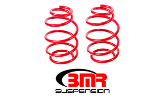 Red BMR Suspension 10-15 5th Gen Camaro V8 front lowering springs, showcasing the coil springs for improved stance and handling.
