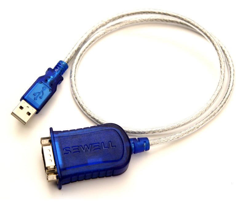 Innovate USB-to-Serial Adapter for gauge components by Innovate Motorsports, showing the compact device with USB and serial ports.