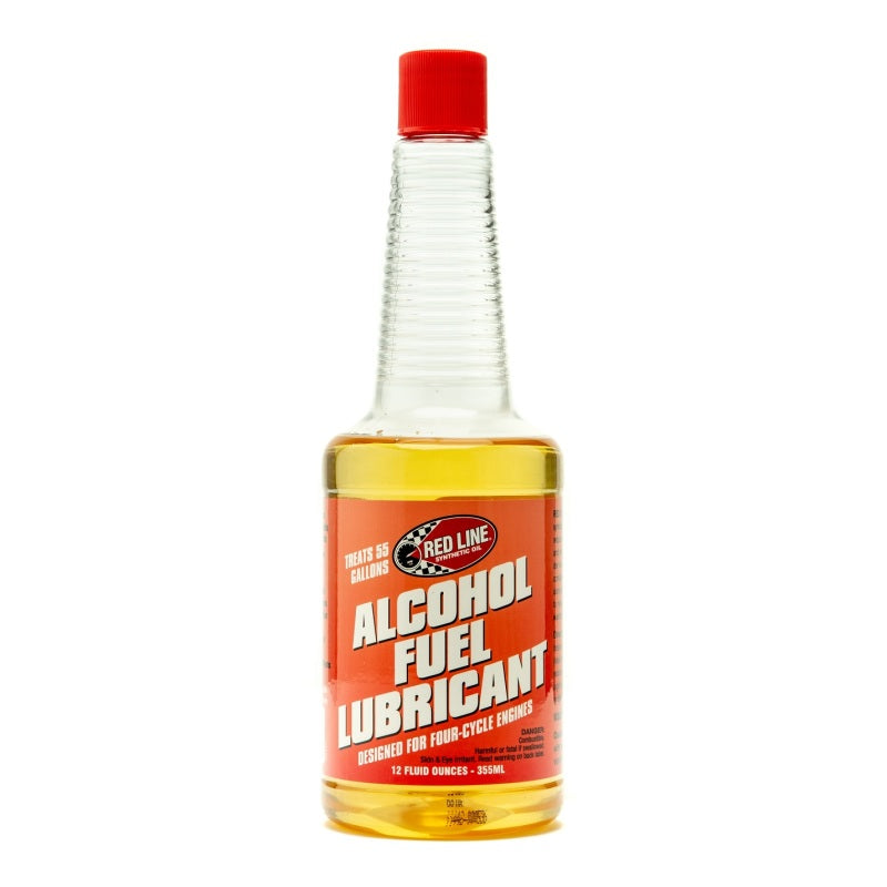 Red Line 4-cycle alcohol fuel lubricant additive in a 12oz bottle, designed to improve engine performance and fuel efficiency.