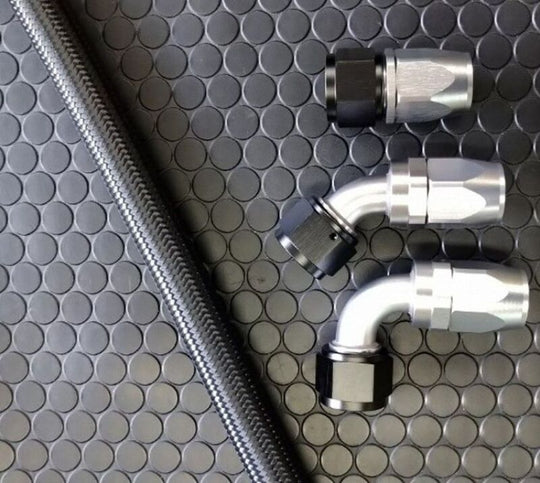 HKS S-Type Oil Cooler Kit for FK8 Civic Type-R, black finish, mounted on engine with hoses and fittings visible