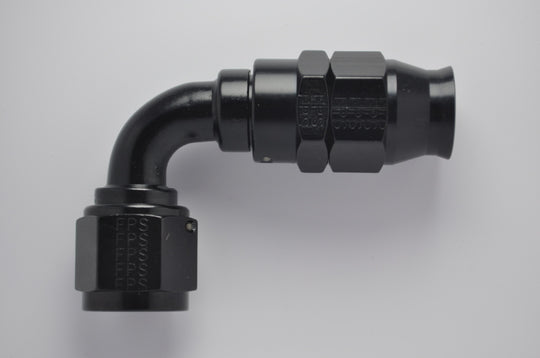 Fragola -6AN Real Street 90-degree black hose end fitting for PTFE hoses, made of durable metal for automotive performance.