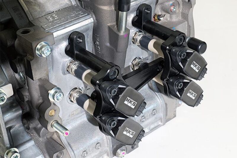 HKS Super Fire Racing Coil Pro for FD3S Mazda RX-7 stock replacement ignition system, close-up view of the ignition coil.