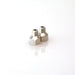 Turbosmart 1/16in NPT male fitting connected to 1/8in NPT female fitting for automotive or turbocharger applications.