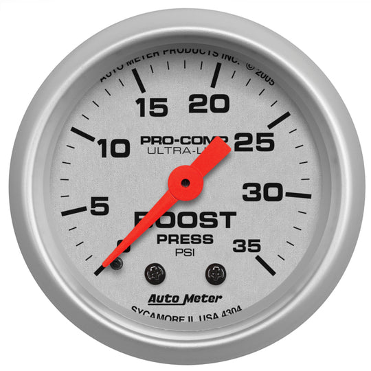 AutoMeter Ultra-Lite 52mm mechanical boost gauge showing 35 PSI for accurate engine boost pressure monitoring.