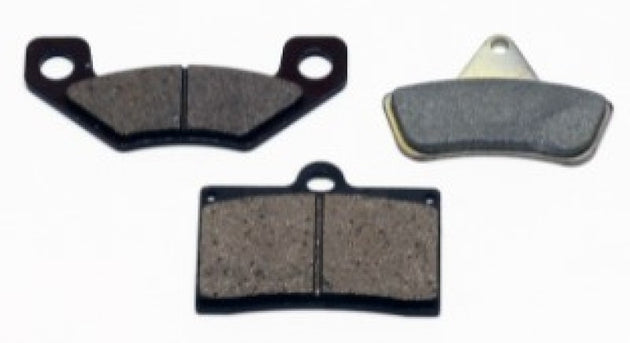 Wilwood racing brake pad set with purple aluminum backing, designed for high-performance racing vehicles.
