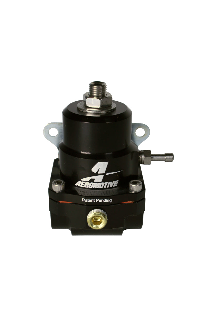 Aeromotive A1000 adjustable EFI fuel pressure regulator with dual -8 inlet and -6 return fittings, mounted on an engine component.