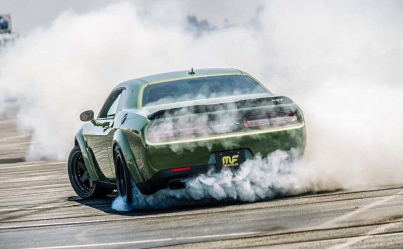 MagnaFlow muffler with 3.5-inch diameter and 18-inch length, featuring dual 2.25-inch inlet and outlet pipes.