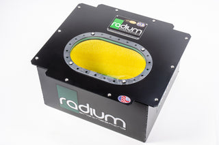 Radium Engineering R06A 6-gallon fuel cell tank for automotive use, shown with mounting hardware and secure fittings.
