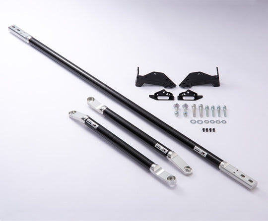 HKS 2020+ Toyota Supra carbon strut brace set installed in engine bay, enhancing chassis rigidity and performance.