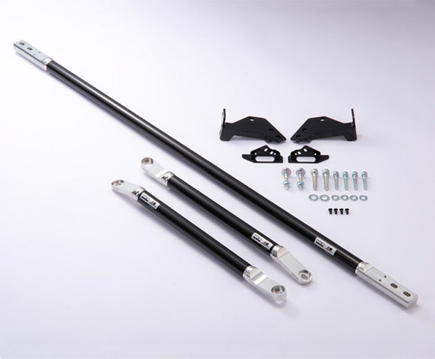 HKS 2020+ Toyota Supra carbon strut brace set installed in engine bay, enhancing chassis rigidity and performance.