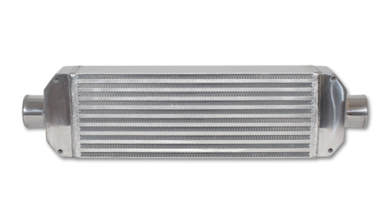 Vibrant air-to-air intercooler assembly with end tanks, measuring 18x6.5x3.25 inches, featuring inlet and outlet ports.