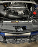 LMP Cadillac CT5-V Blackwing expansion tank showing black plastic construction with mounting points and hose connections.