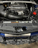 LMP Cadillac CT5-V Blackwing expansion tank showing black plastic construction with mounting points and hose connections.