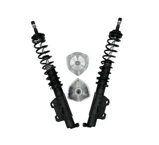 Pair of Menscer ZL1 LMP front shocks for performance suspension, showcasing the shock absorbers with mounting components.