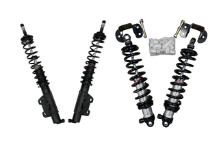 Menscer Motorsports LMP shock and strut package for front and rear, showcasing durable suspension components for racing vehicles.