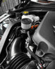 LMP Cadillac CT4-V Blackwing catch can, black metal engine part with hoses attached, designed for vehicle performance.