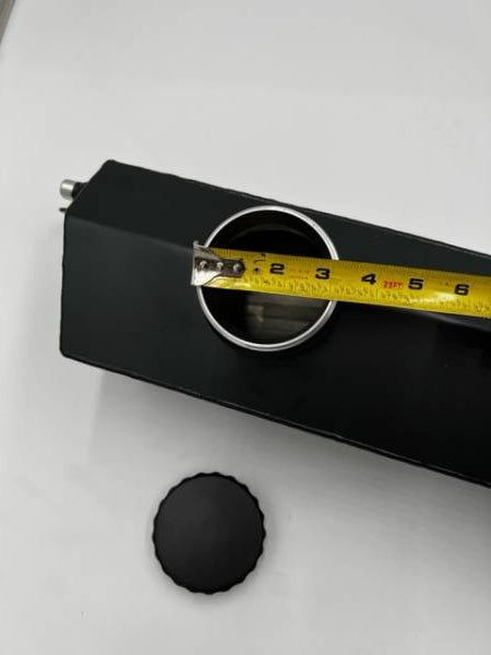 LMP ZL1 front bumper ice expansion tank for cooling system, shown mounted on vehicle front bumper area.