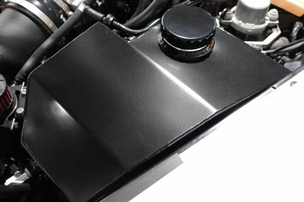 LMP C7 Z06 front expansion ice tank showing clear plastic construction and mounting points for Chevrolet Corvette.