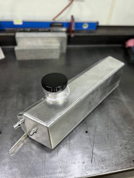 LMP Cadillac CT4-V Blackwing expansion tank in black, showing the tank with mounting and hose connections visible.