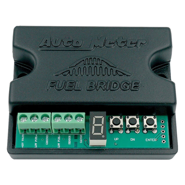 AutoMeter fuel signal adapter for AM gauges, shown with wiring and connector for automotive fuel level measurement.