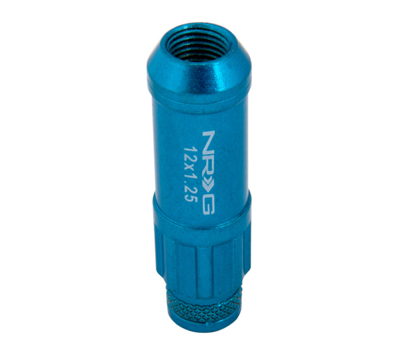 NRG 700 Series M12 x 1.25 steel lug nut set with dust cap, locks, and lock socket in blue, for vehicle wheel installation.