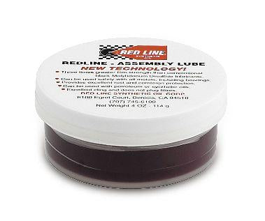 Red Line Assembly Lube 16oz bottle, a high-performance grease and lubricant for engine assembly, with red and white packaging.