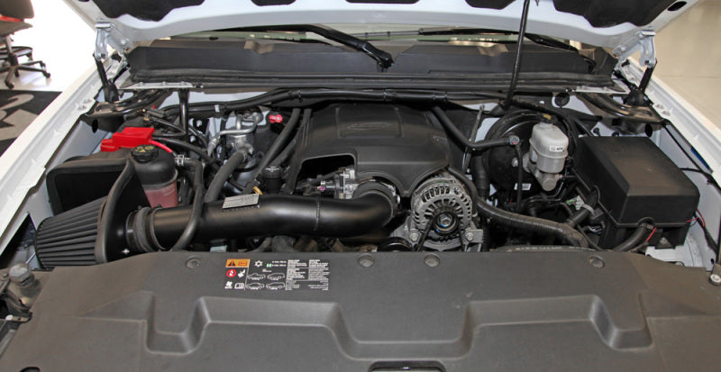 K&N cold air intake kit for 2009-2013 Chevy Silverado 1500, Avalanche, Suburban, and GMC Yukon in black performance finish.