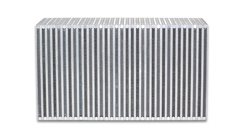 Vibrant vertical flow intercooler core with 18-inch width, 12-inch height, and 6-inch thickness showing its metal fins and core structure.