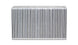 Vibrant vertical flow intercooler core with 18-inch width, 12-inch height, and 6-inch thickness showing its metal fins and core structure.