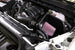 K&N Engineering cold air intake system for Chevrolet 1500 V8 trucks, featuring a high-performance air filter and intake tube system.