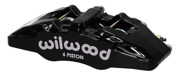 Wilwood Forged Dynapro 6 brake caliper with 5.25-inch mount, dual pistons, and disc for high-performance vehicle braking.