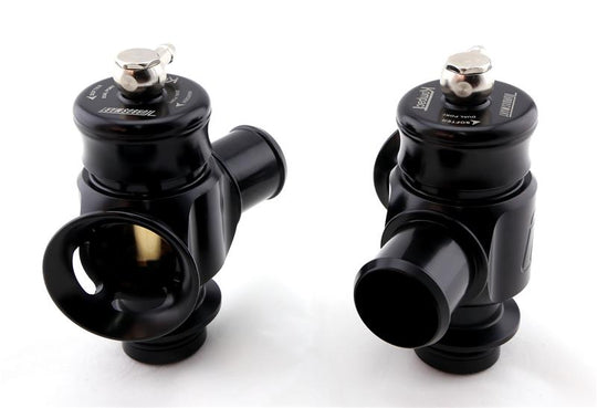 Turbosmart BOV Kompact Dual Port blow off valve installed in a 2016 Cadillac ATS-V 3.6L twin-turbo engine, showcasing the sleek black unit