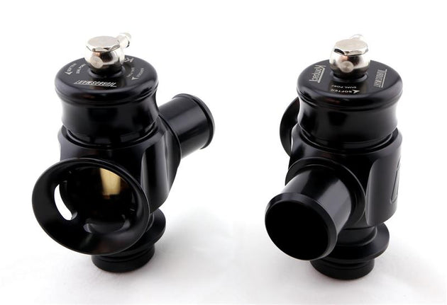 Turbosmart BOV Kompact Dual Port blow off valve installed in a 2016 Cadillac ATS-V 3.6L twin-turbo engine, showcasing the sleek black unit